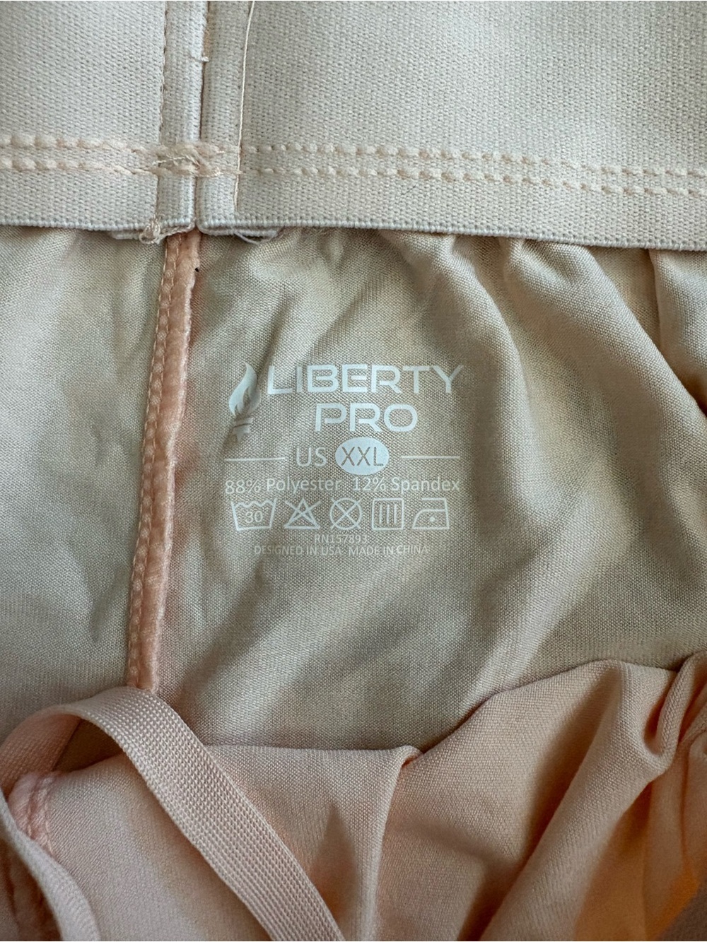 Liberty Pro Peach Athletic Shorts with Black Zip Pockets - Picture 3 of 5